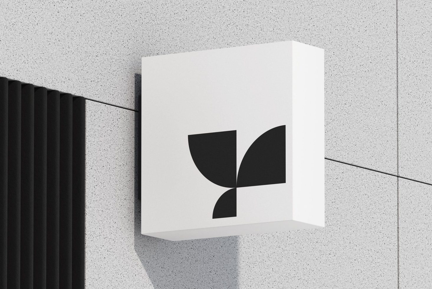 Minimalist book cover mockup on textured wall with geometric shadow, graphic design presentation, modern branding showcase.