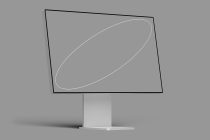 Desktop monitor mockup with blank gray screen on stand