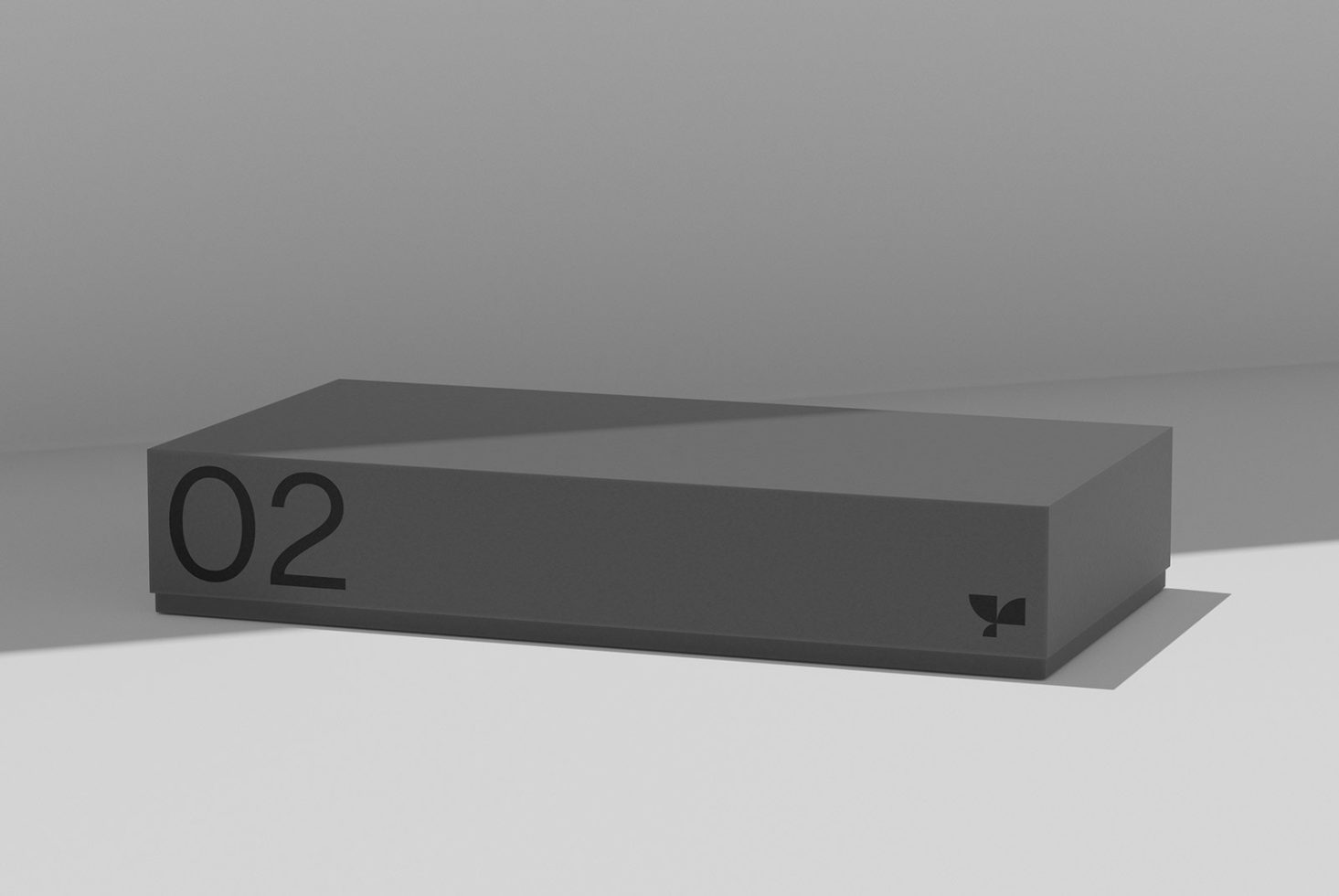Gray rectangular box with 02 marking, minimal branding visible