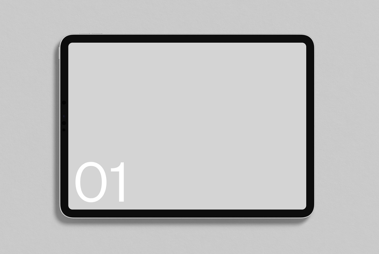 Minimalistic tablet mockup with shadow on a grey background, ideal for presenting app and web designs for a clean and modern display.
