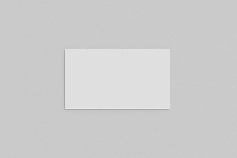 Minimalist blank square paper mockup on a textured grey background for graphic design presentation and portfolio.