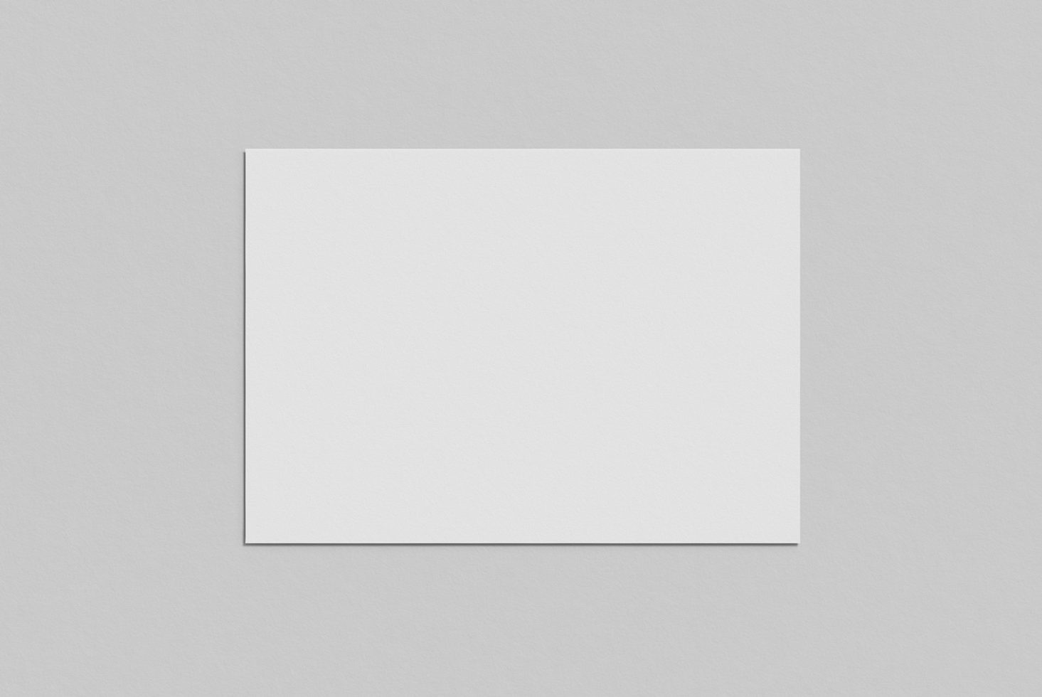 Minimalist white square paper mockup on a textured grey background, ideal for sleek design presentations and branding.