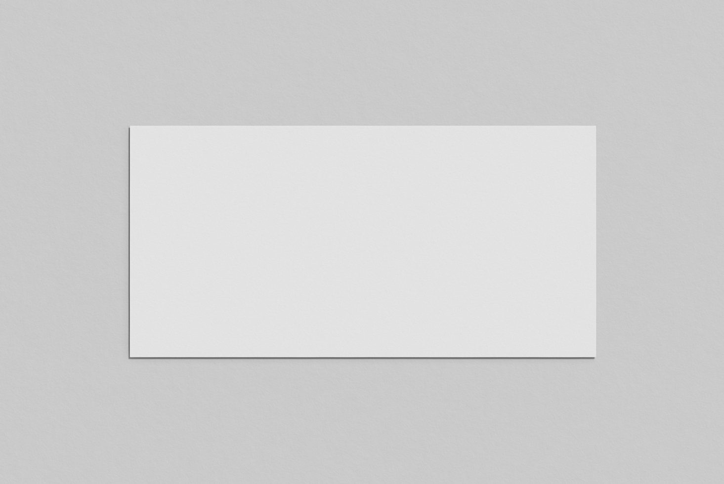 Blank horizontal white paper card mockup with shadow on a light grey background, perfect for design presentations, print template.