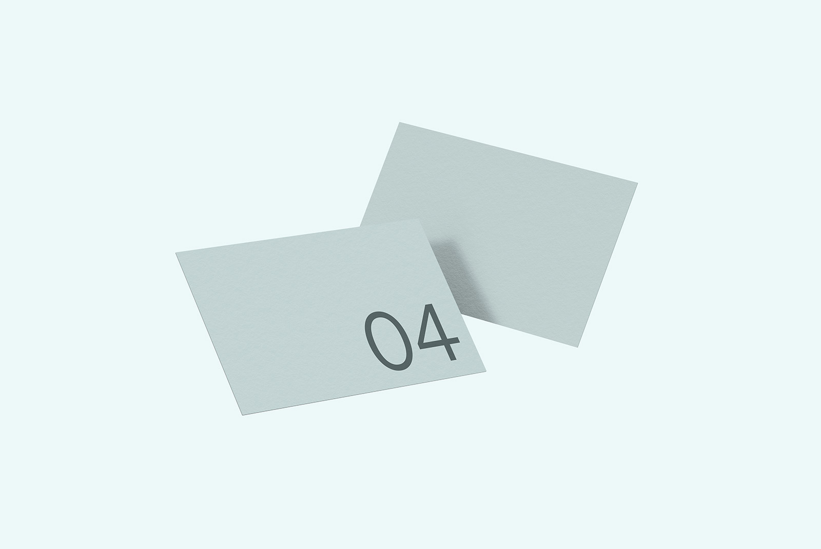 Two minimalist paper cards mockup on a light background, ideal for clean and contemporary card design presentations for designers.