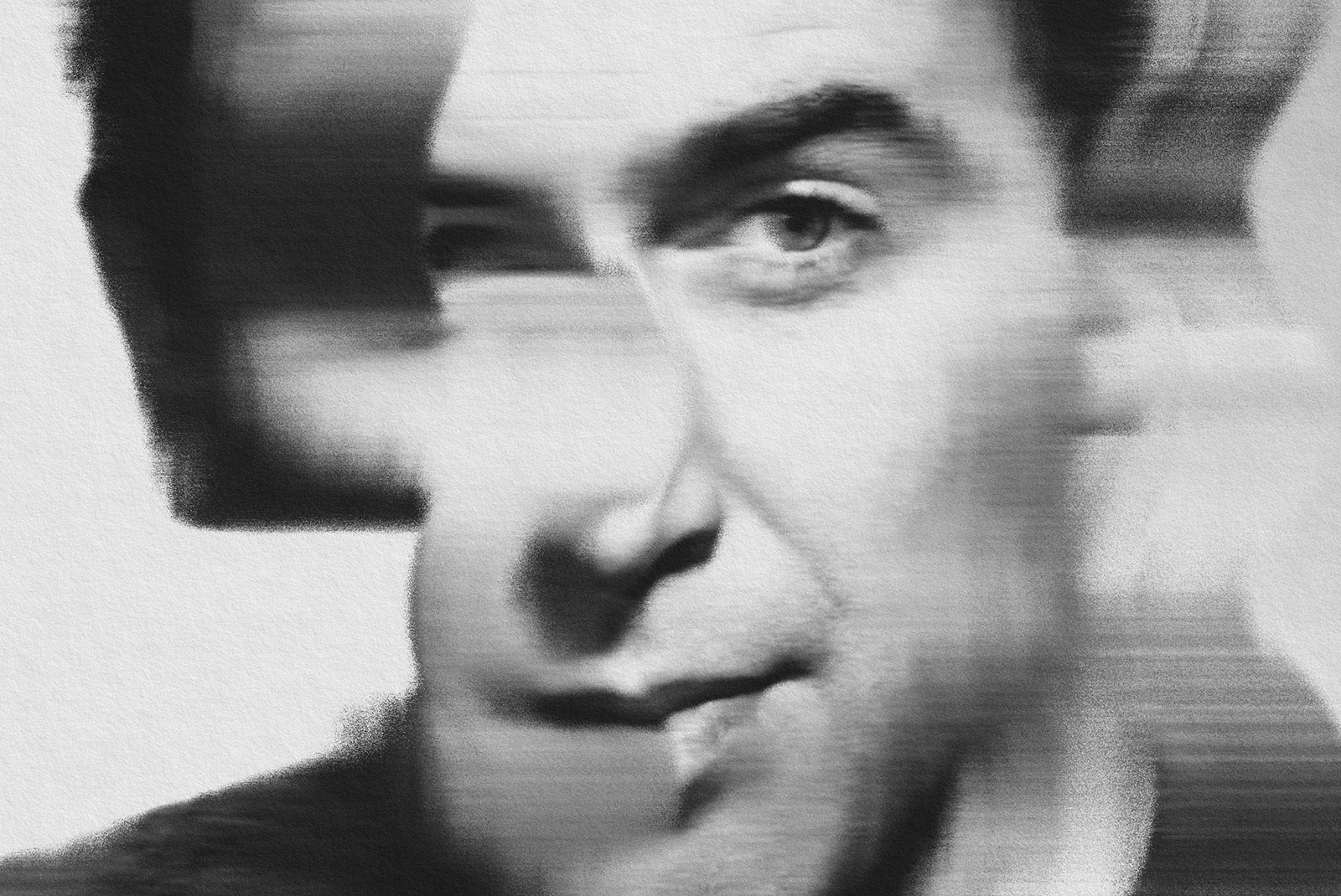Black and white distorted portrait of a man for creative graphic design templates. Blurred and artistic effect for unique visuals.