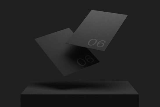 Elegant floating black brochure mockup with reflective shadow, ideal for presentation, showcasing design and branding work.
