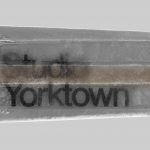 Ice pop with text "Yorktown" frozen inside, ideal for food mockups, advertising graphics, and frozen treat design templates.