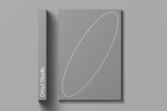 Elegant book cover mockup with minimalist design, textured fabric background, and clean white line art, ideal for presentation.