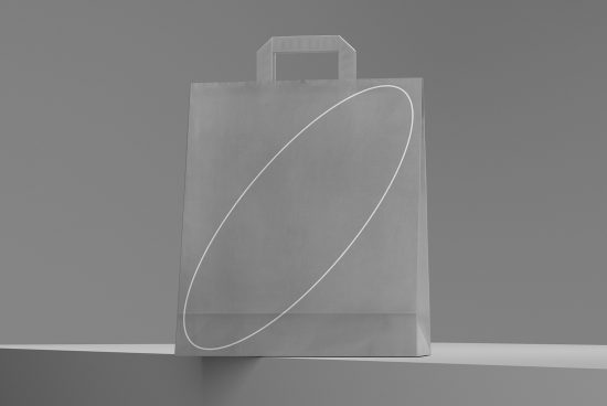 Minimalist shopping bag mockup on a gray background, showcasing space for brand design, perfect for presentations in graphic design assets.