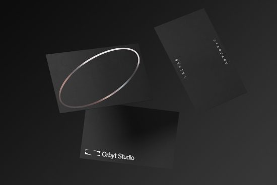 Elegant black business cards mockup with silver logo and typography perfect for designers to showcase branding and identity projects.