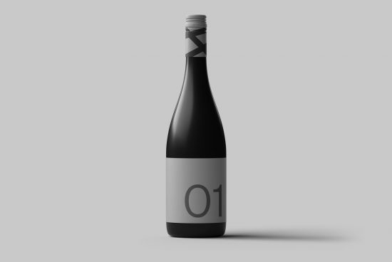 Minimal wine bottle mockup with label design, isolated on gray background, for presentations and branding projects.