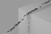 Light grey angled ribbon mockup showing serif typography in shadow perspective