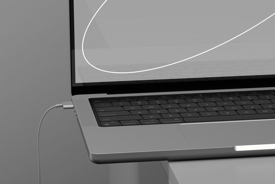 Laptop angled view with minimalist oval line on gray screen