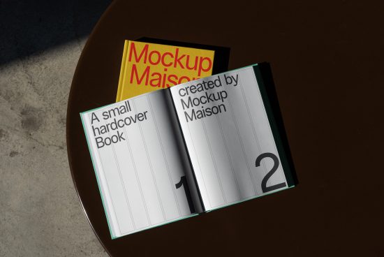 Photorealistic book mockups with hardcovers on a circular table for graphic design presentation, showcasing sharp shadows and layout.