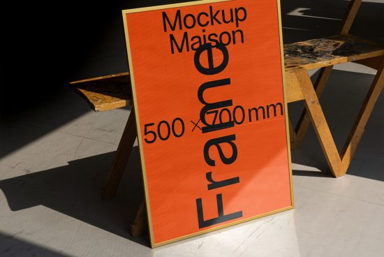 Mockup frame leaning against wooden easel with distinctive shadows, showcasing bold typography, ideal for designers portfolio presentation.