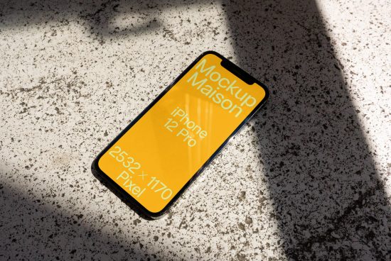iPhone 12 Pro mockup on textured surface with shadows, ideal for digital asset designers creating realistic presentations.