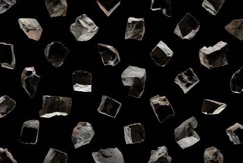 Floating stone chunks on a black background, realistic 3D render for mockups, graphics, game design, and digital art.