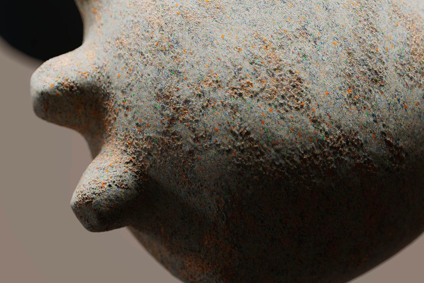 Close-up texture of a terracotta pot with speckled design suitable for graphics category, ideal for realistic mockup textures.