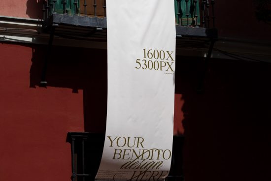 Vertical banner mockup hanging on a building facade for outdoor advertising design projects with editable text space for designers.