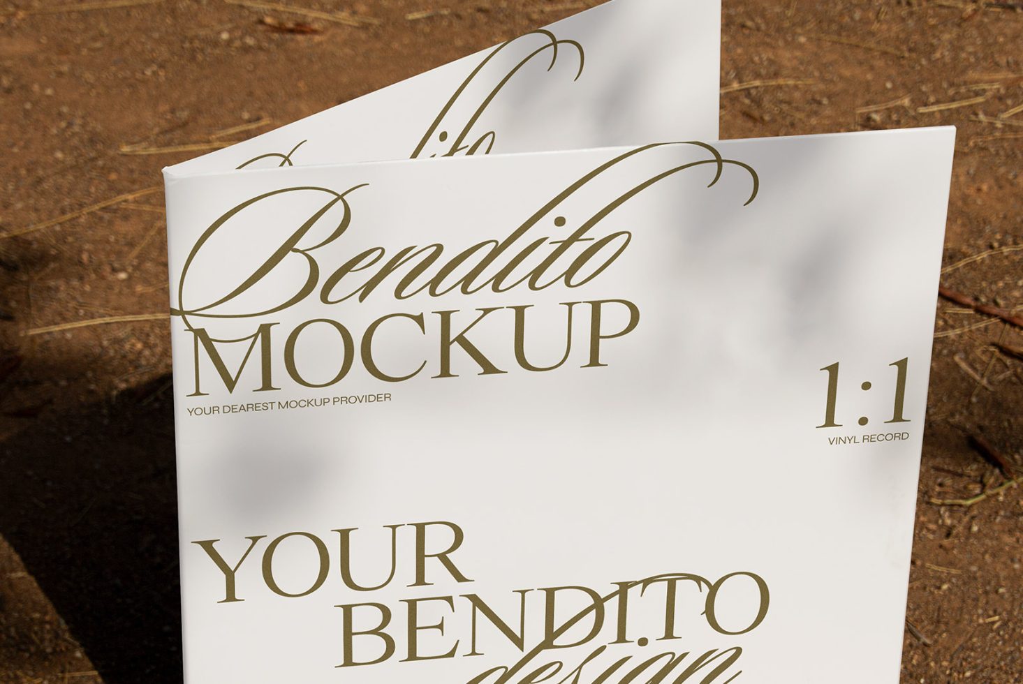 Elegant paper mockup with stylized gold script font, perfect for showcasing designs to clients in the graphics and templates category.