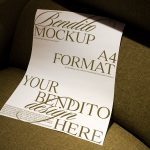 Printed paper mockup on a textured couch showcasing editable A4 design template, ideal for presentations, graphics, and portfolio.