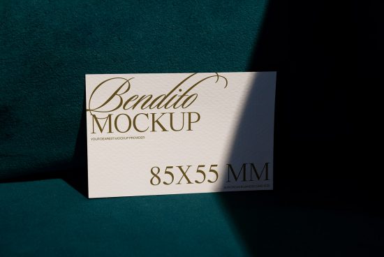 Elegant business card mockup on teal background showcasing font and shadow play, ideal for designers focusing on branding and stationery.
