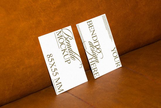 Elegant business card mockup on leather surface, realistic design presentation, 85x55mm card, essential for graphic designers.
