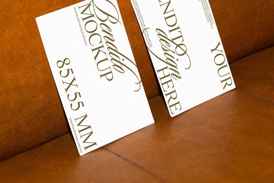 Two Bendito business cards fanned on brown leather showing front back layout