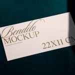 Elegant envelope mockup on teal background highlighting custom font design, ideal for presentations and branding with dimensions 22x11 cm.