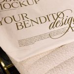 Elegant script font on fabric mockup showcasing design versatility, ideal for graphics and templates display with a professional, artistic touch.