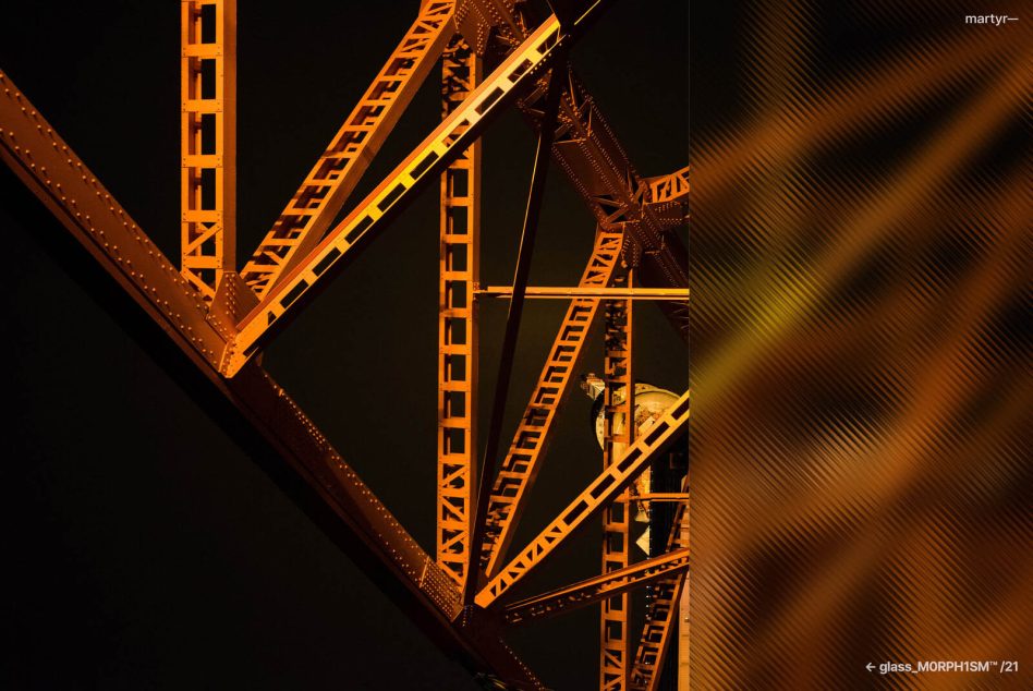Glowing orange steel bridge structure at night with vertical scan line distortion