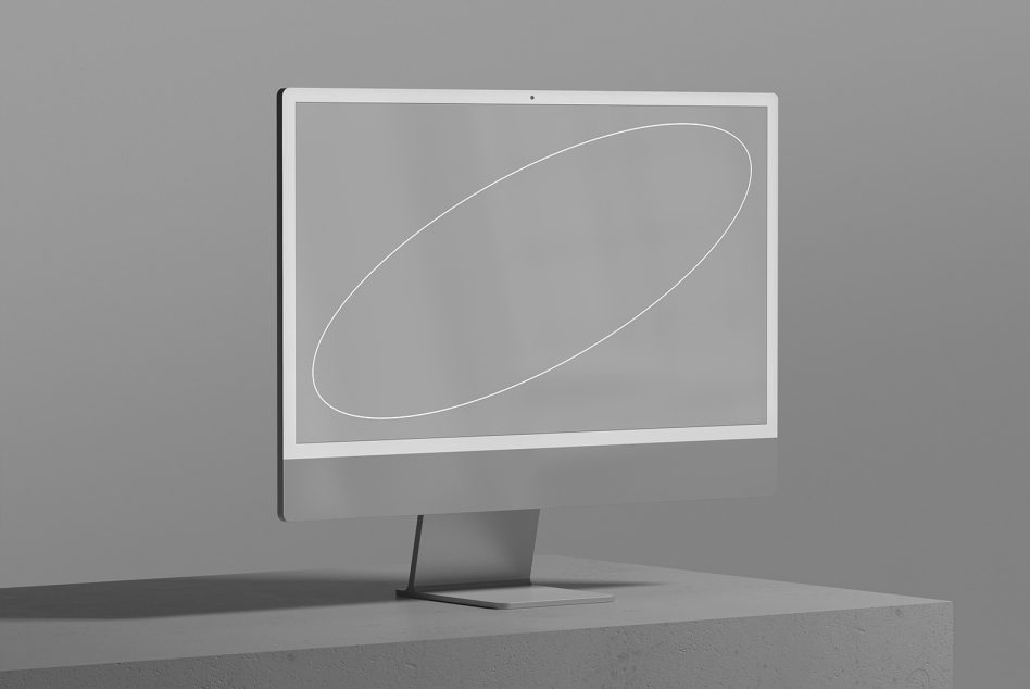 Minimalistic computer monitor mockup on a gray background, showcasing a sleek design with a subtle geometric wallpaper, ideal for template display.