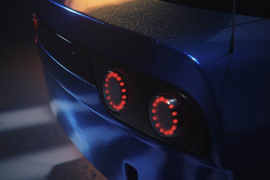 Close-up of a car's rear light design with a metallic blue finish for vehicle mockup graphics.