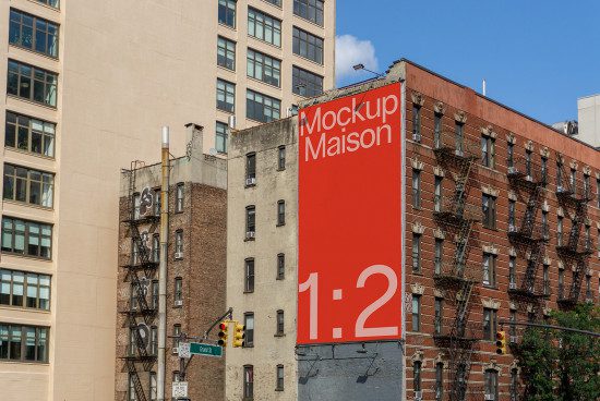 Urban billboard mockup on building side for advertising design presentation, cityscape backdrop, clear sky, street view.