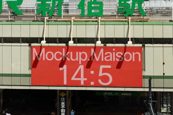 Red billboard mockup with stylized text 'MockupMaison 14:5' for outdoor advertising display, urban setting with passing train in background.