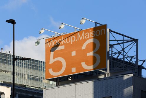 Outdoor billboard mockup with clear sky, ideal for presenting advertising designs, branding, and large format graphics to clients.