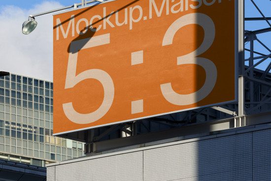 Outdoor billboard mockup on urban building for advertising design presentation, clear sky, realistic texture, daylight setting.