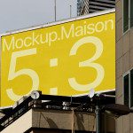 Billboard mockup on building with bright yellow design, showcasing typography and large ratio numbers 5:3 for outdoor advertising display.