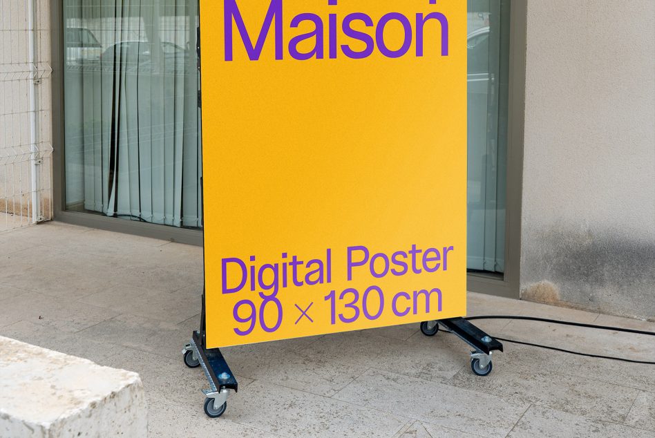 Bright yellow poster on wheeled stand showing purple text for Maison digital poster mockup