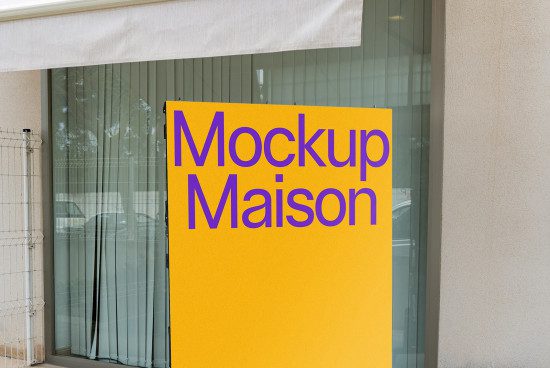 Yellow storefront sign mockup with bold purple text "Mockup Maison" for urban shop facade design presentation.