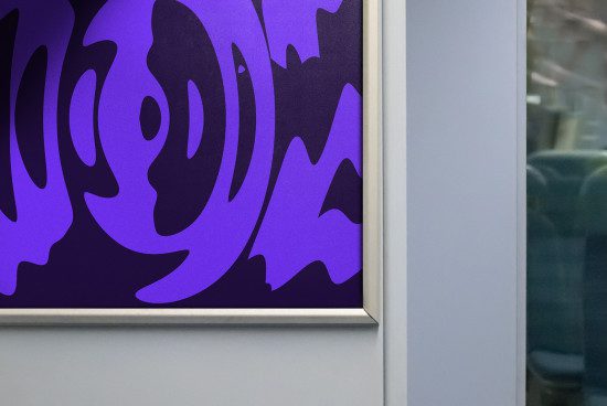 Modern abstract framed graphic art in purple hues displayed in a subway, ideal for contemporary graphics or template design inspiration.