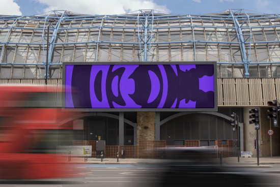 Urban billboard mockup featuring a large purple sign with abstract design on a modern metal framework above a street with blurred traffic.