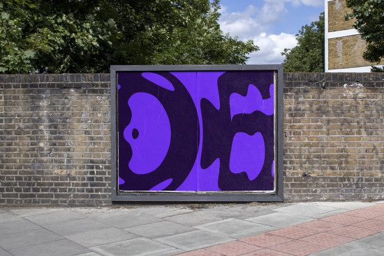Urban billboard mockup with a vibrant purple abstract design poster on a brick wall, clear day, for outdoor advertising graphic display.