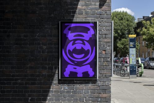 Vibrant purple poster design mockup displayed on urban brick wall, graphic template, modern street style, clear sunny day, outdoor billboard presentation.