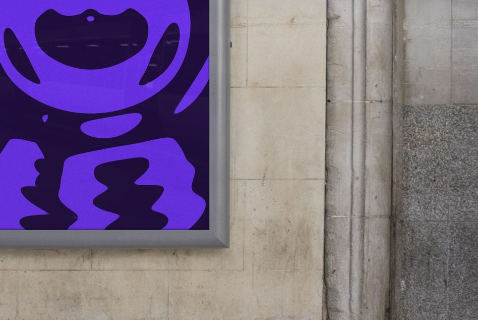Close-up of purple neon character face with organic shapes on dark background
