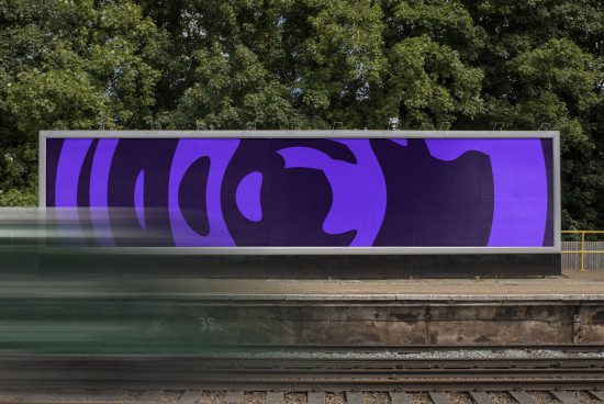 Billboard mockup on a train station platform with a purple abstract design for advertising, graphic design, and outdoor media presentation.