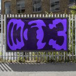 Urban street art banner mockup with bold purple abstract graffiti design on fence, ideal for presentation of graphic designs.