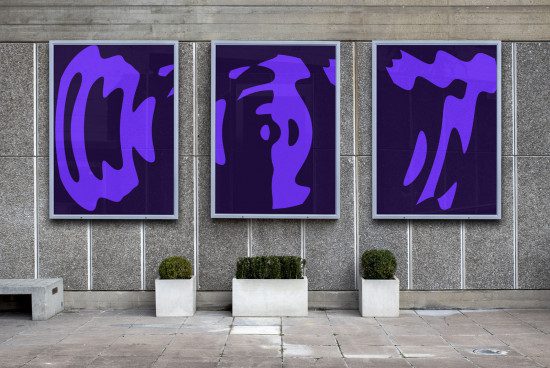 Three vertical urban poster mockups with abstract purple graphics displayed on a street, ideal for designers and advertisers.