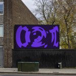 Outdoor billboard mockup on urban street showcasing purple abstract graphics design, ideal for presenting branding and advertising work.