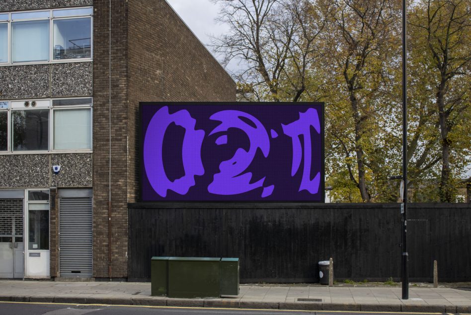 Outdoor billboard mockup on urban street showcasing purple abstract graphics design, ideal for presenting branding and advertising work.